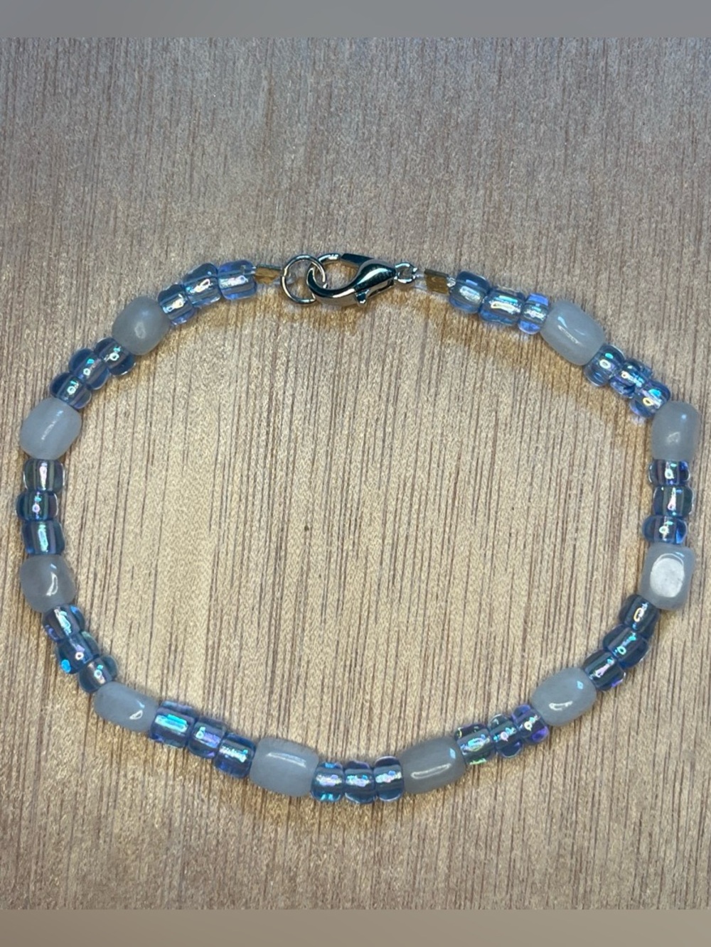 Handcrafted Iridescent Blue Beaded bracelet with Opalescent Accents